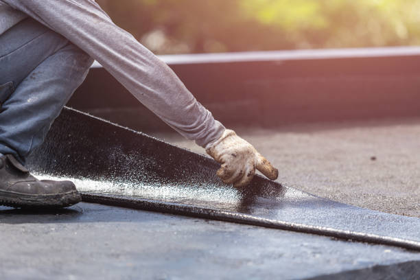 Professional Basement Waterproofing technician working in Estell Manor, NJ